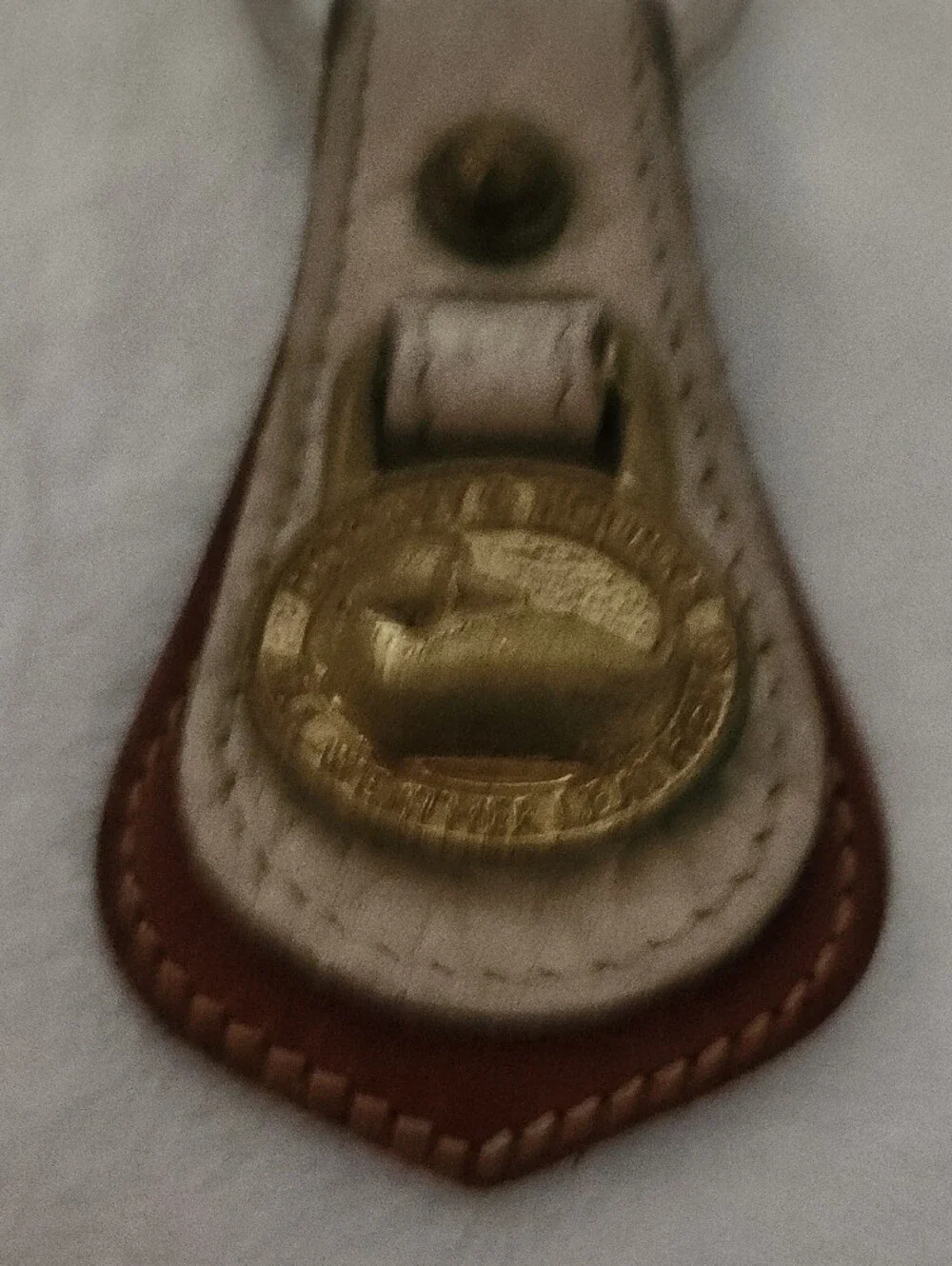 Dooney & Bourke Brown and Cream Leather Key Fob with Brass Medallion